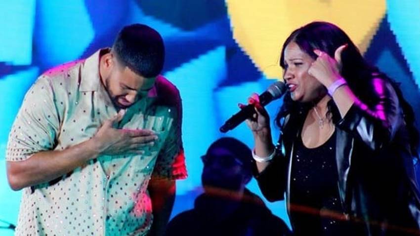 Aventura sorprende con Judy Santos en su concierto en el MetLife Stadium